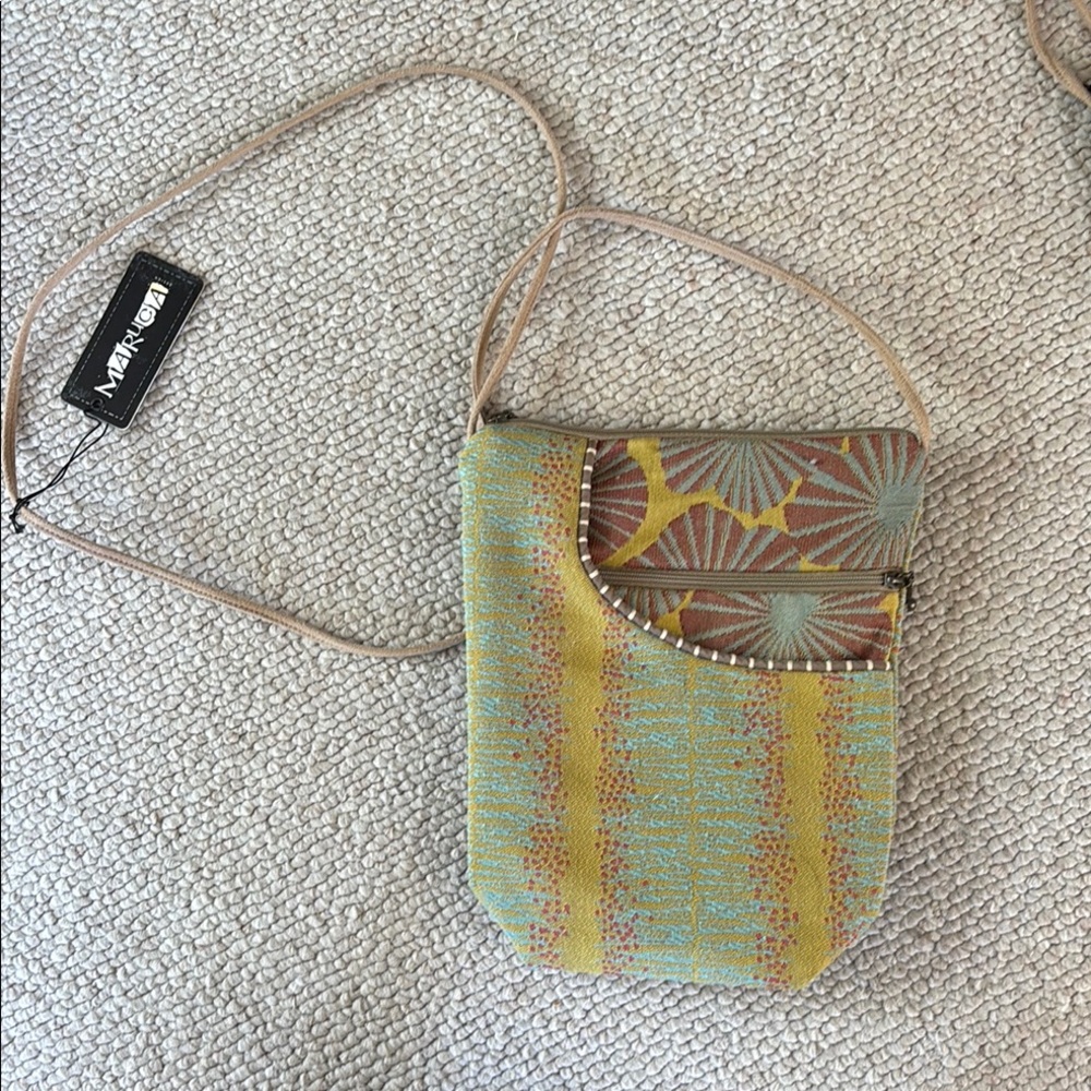 Vibrant Yellow and Green Crossbody Bag with Sunburst Design